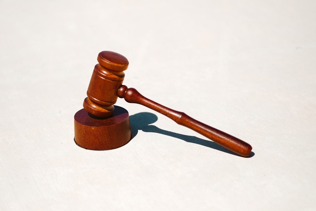 Wooden gavel resting on a block, symbolizing legal decisions and adolescent drug abuse concerns.