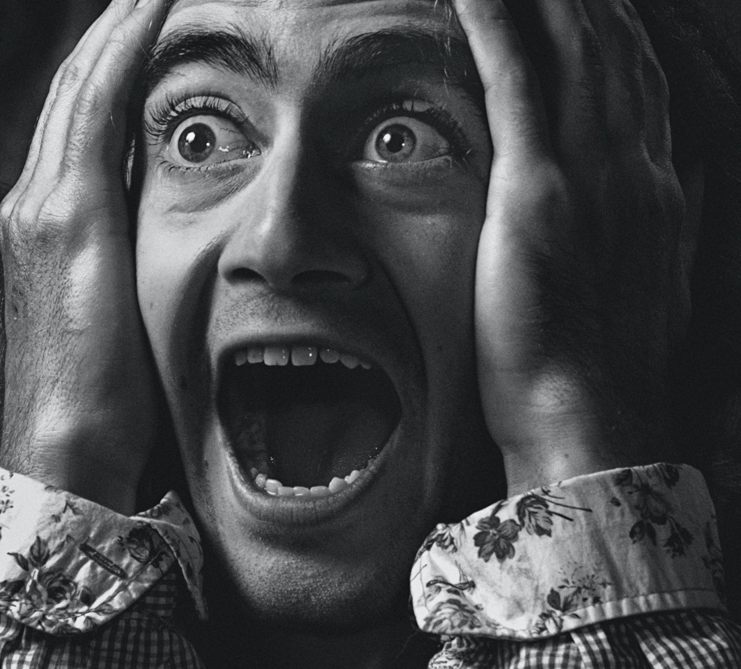 Man expressing distress, illustrating destructive language and bad habits.