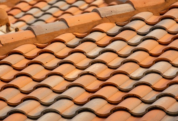 Close-up of clay tile roof illustrating roofing materials and durability.