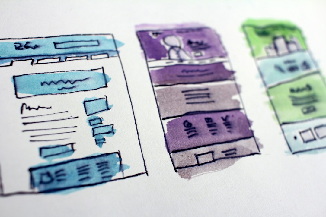 Website design sketches and layouts illustrating web developer site design process.