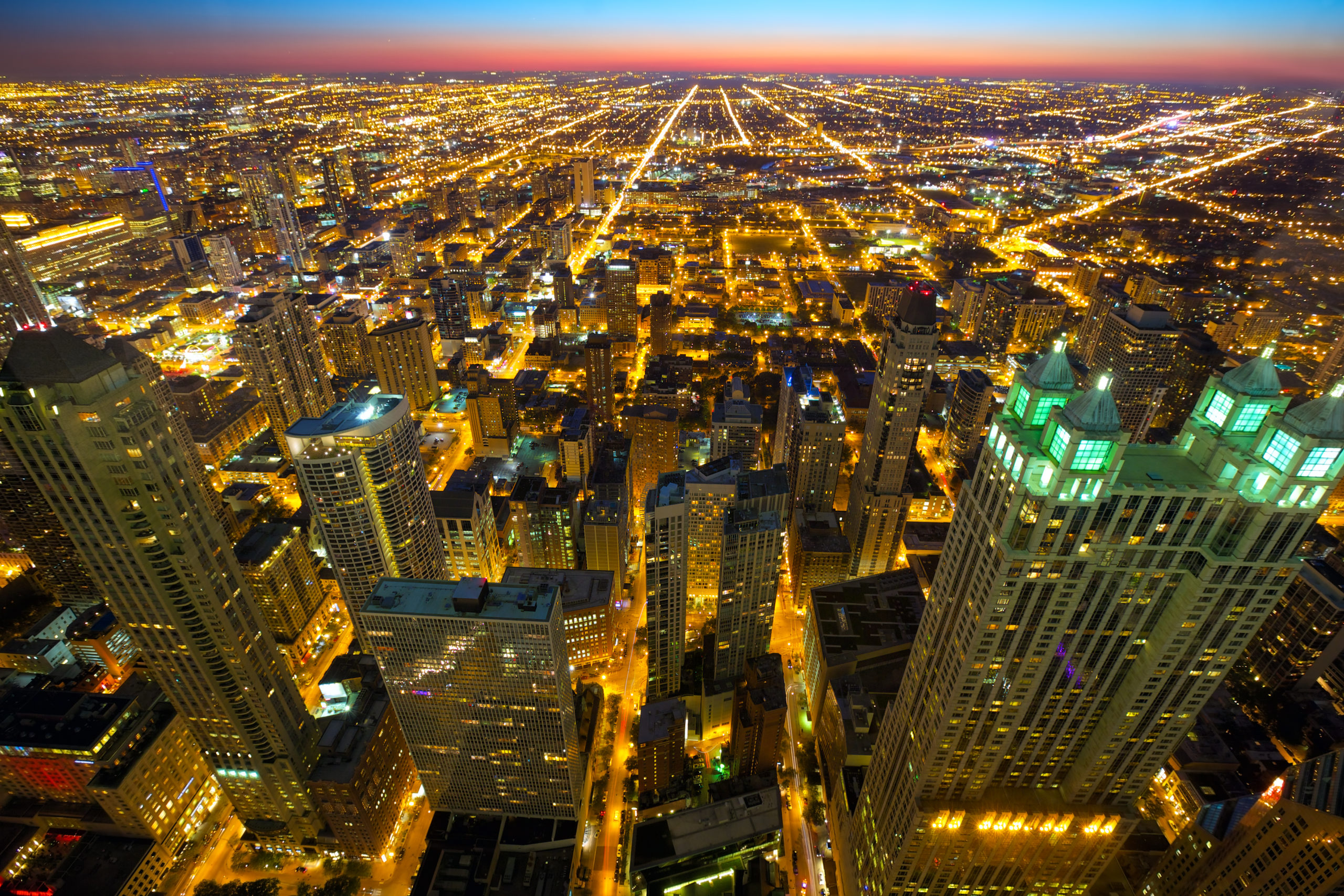 Aerial view of Chicago skyline at twilight, Illinois, USA, illustrating business opportunities.