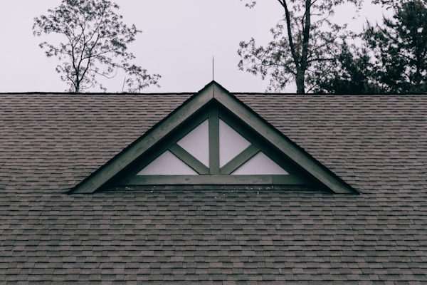 Roof structure detail and dormer window illustrating roof replacement considerations