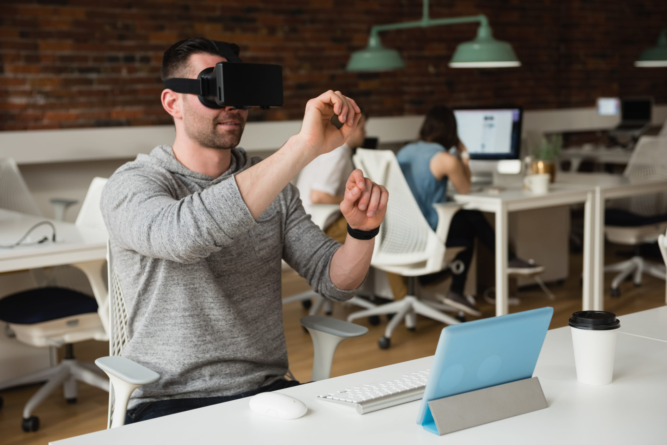 Business executive using virtual reality headset in modern office exploring technology for business growth